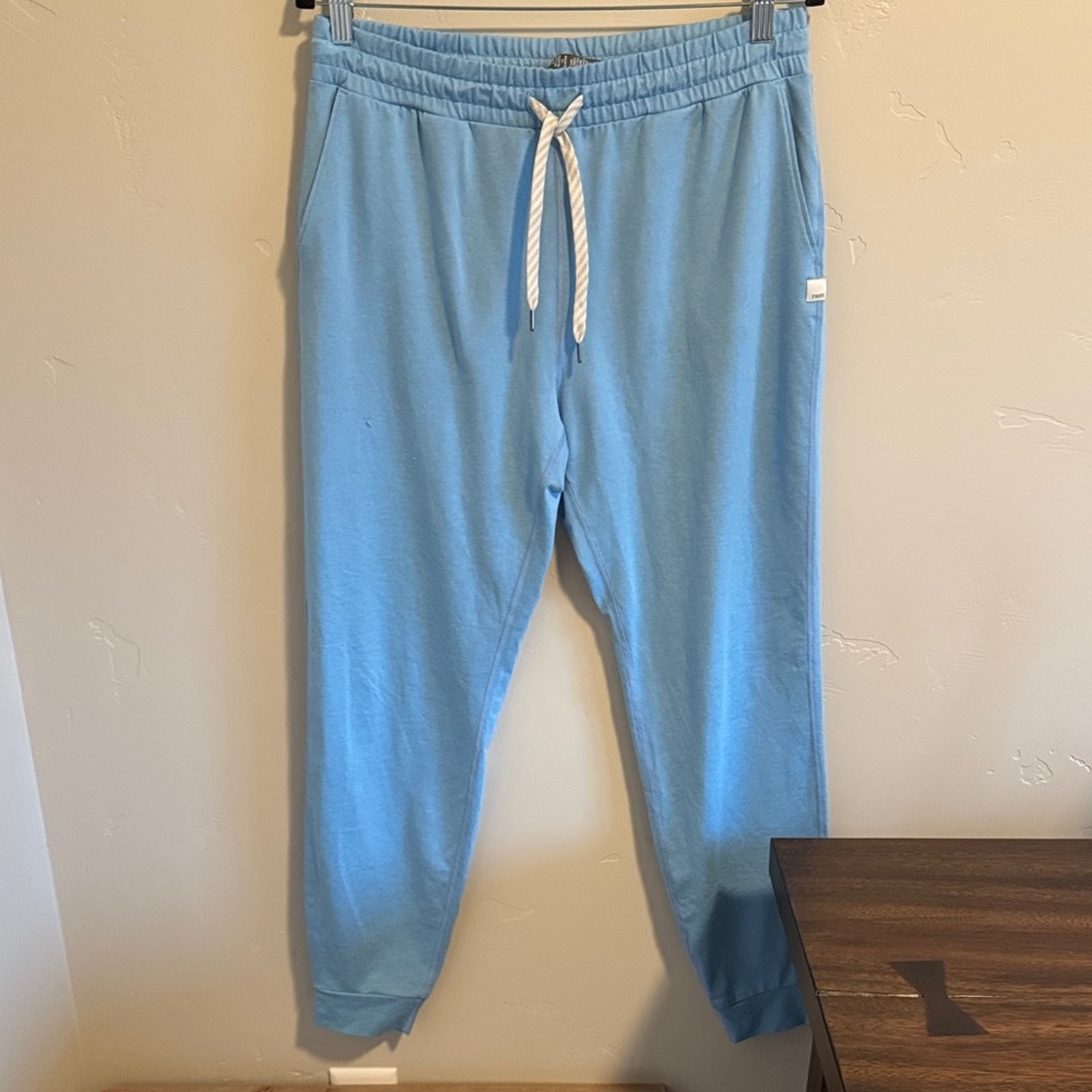 Vuori performance joggers in light blue. NWOT sold out online